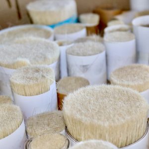 Bunches of natural goat hair for brush making. A very traditional material for brushes.